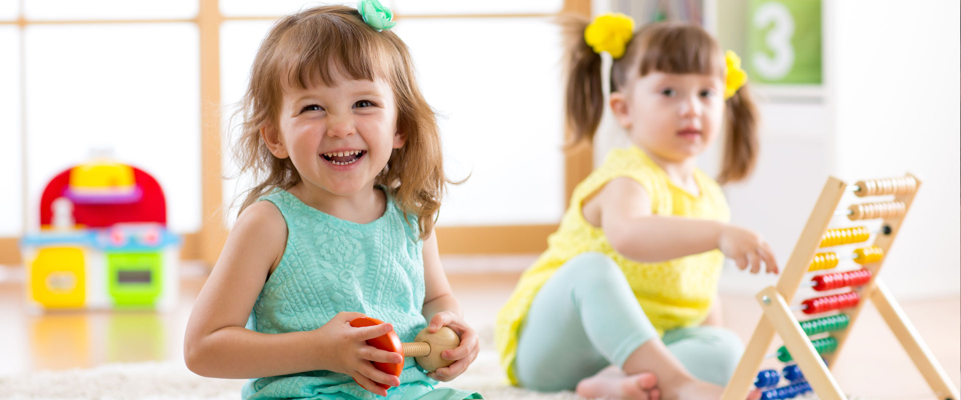 Teacher working one-on-one with a preschool child